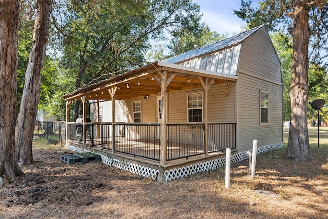 view of front of house with a wooden deck