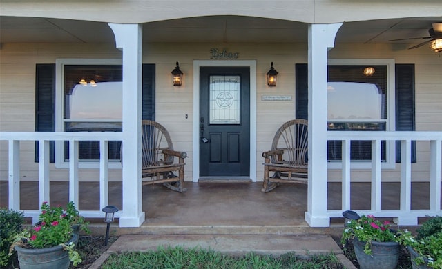 property entrance featuring ceiling fan and covered porch