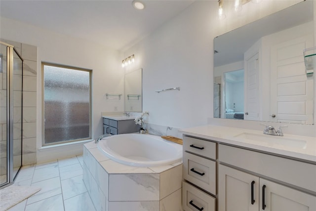 bathroom featuring tile flooring, vanity, and independent shower and bath