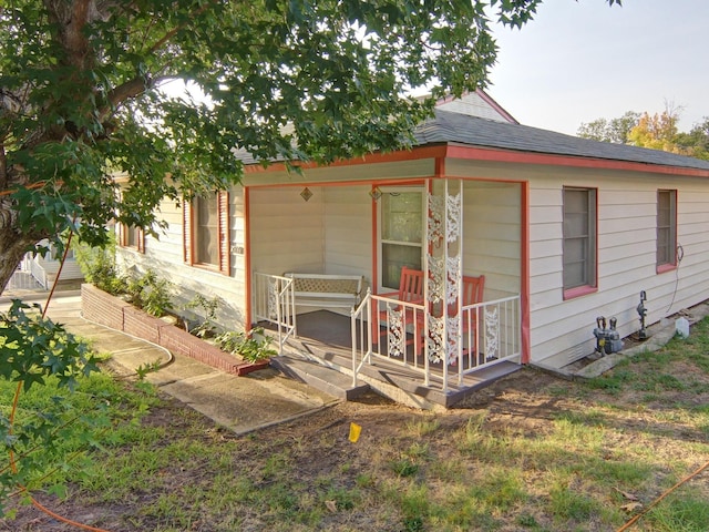 5017 Thurston Rd, River Oaks, TX 76114 - back of property with covered porch and roof with shingles