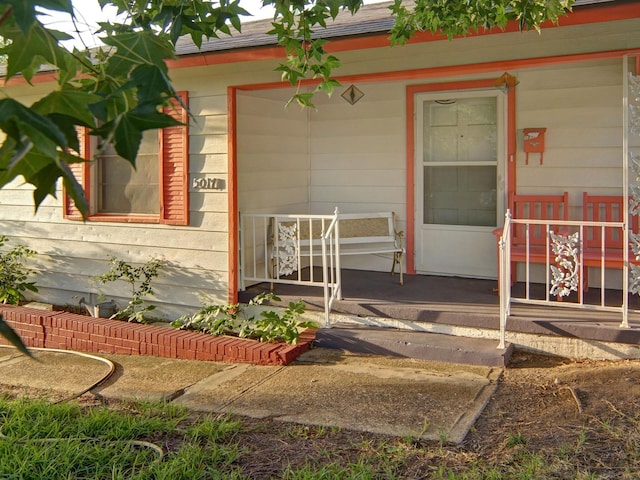5017 Thurston Rd, River Oaks, TX 76114 - doorway to property featuring covered porch