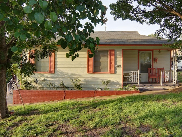 5017 Thurston Rd, River Oaks, TX 76114 - view of front facade with a porch and a shingled roof