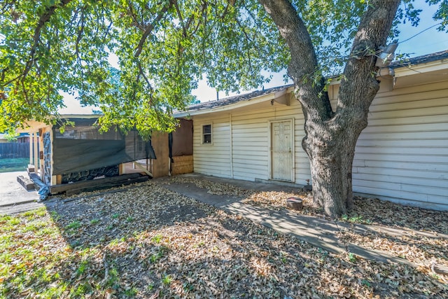 exterior space featuring wood walls