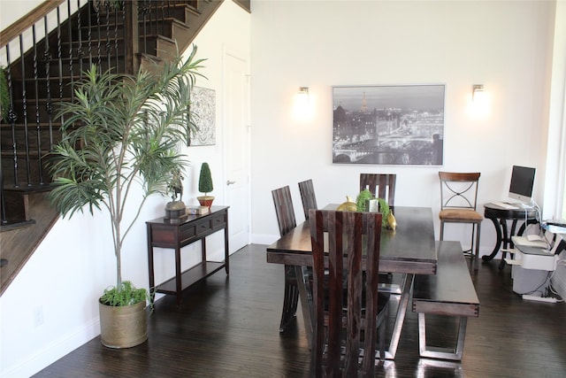 dining area featuring dark hardwood / wood-style flooring