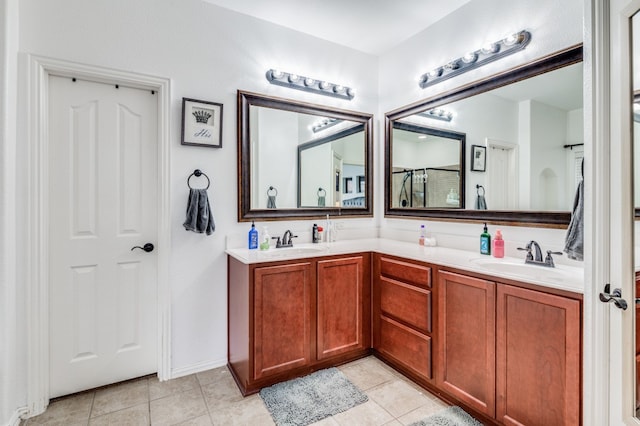 bathroom with tile floors and dual bowl vanity