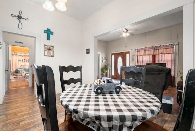 dining room featuring ceiling fan and light wood-type flooring