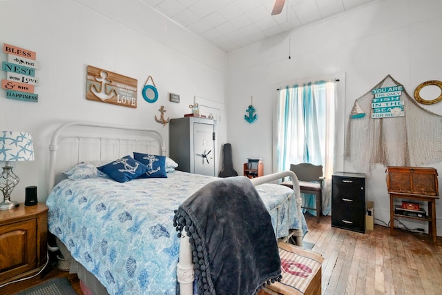 bedroom featuring ceiling fan and light hardwood / wood-style flooring