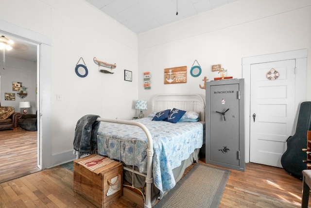 bedroom featuring dark hardwood / wood-style floors