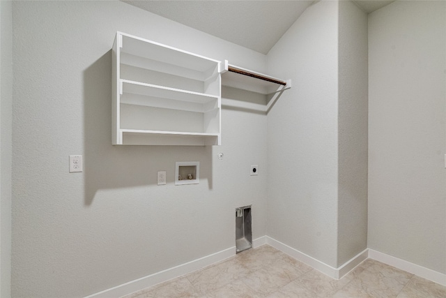 washroom featuring light tile flooring, gas dryer hookup, washer hookup, and hookup for an electric dryer