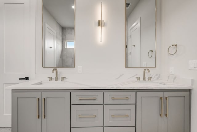 bathroom with dual vanity