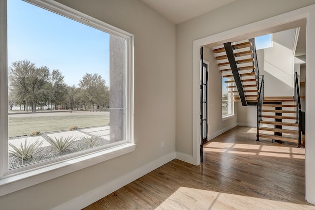 spare room featuring light wood-type flooring