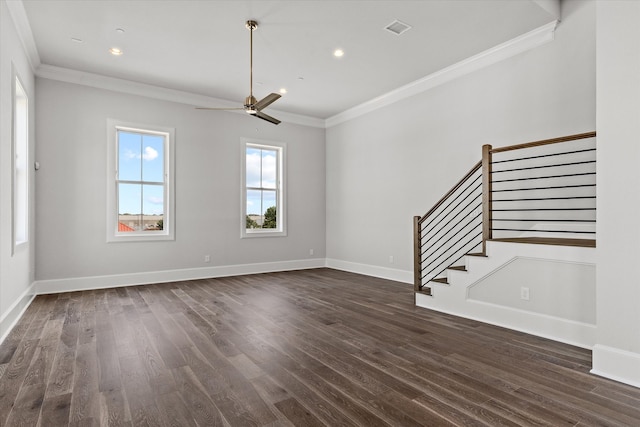 unfurnished living room with ornamental molding, ceiling fan, and dark wood-type flooring