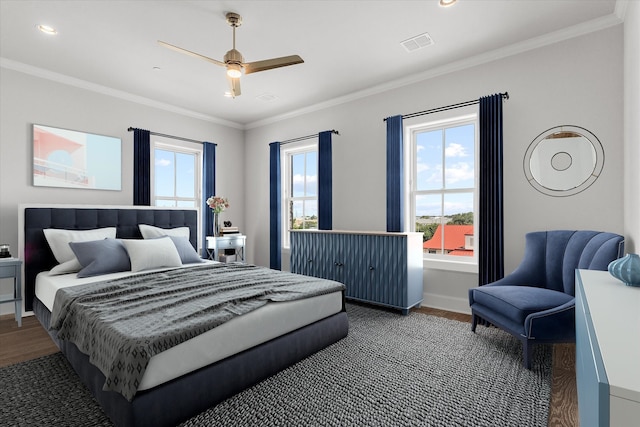 bedroom featuring crown molding, ceiling fan, and dark wood-type flooring