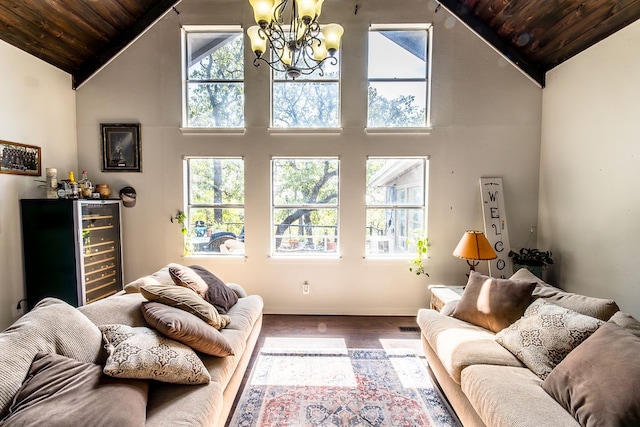 living room with wood ceiling, beverage cooler, hardwood / wood-style flooring, high vaulted ceiling, and a notable chandelier