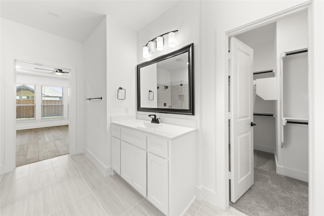 bathroom with vanity, tile patterned floors, and ceiling fan