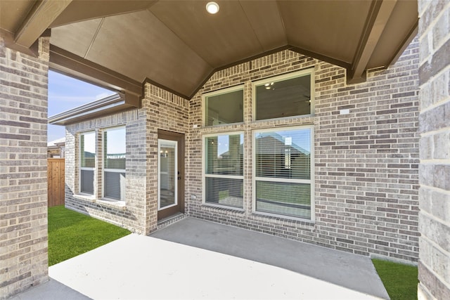 entrance to property with a patio area