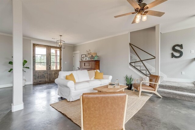 living room featuring crown molding, french doors, and ceiling fan