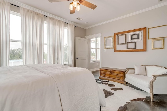 bedroom with multiple windows, ceiling fan, and crown molding