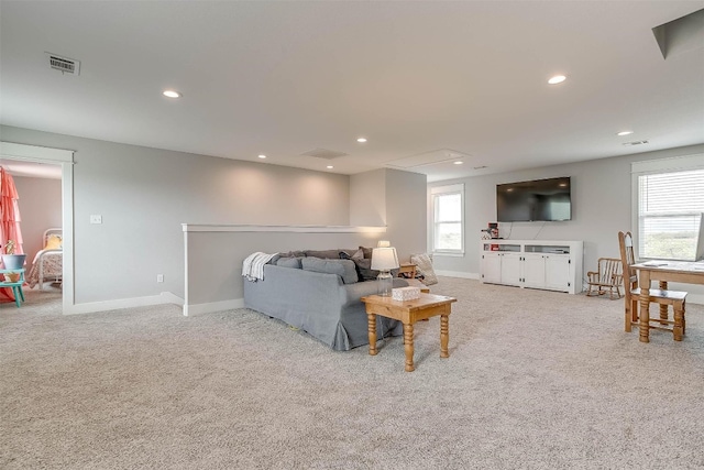 living room with light colored carpet