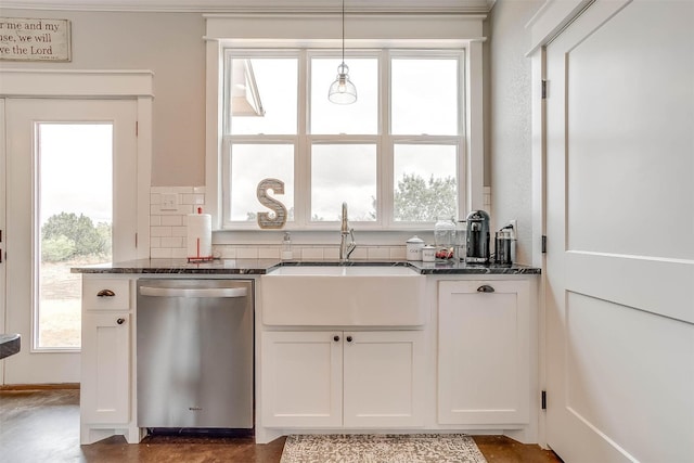 kitchen featuring dishwasher, pendant lighting, white cabinetry, and sink