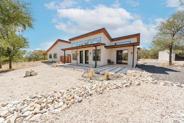 rear view of property with a patio