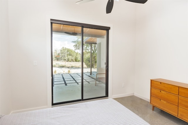 unfurnished bedroom featuring access to outside and ceiling fan