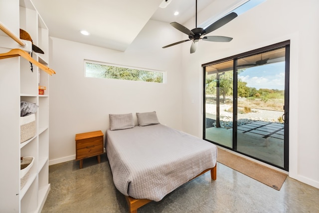 bedroom featuring concrete floors, access to outside, and ceiling fan