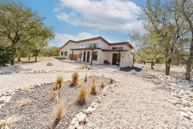 rear view of property with a patio