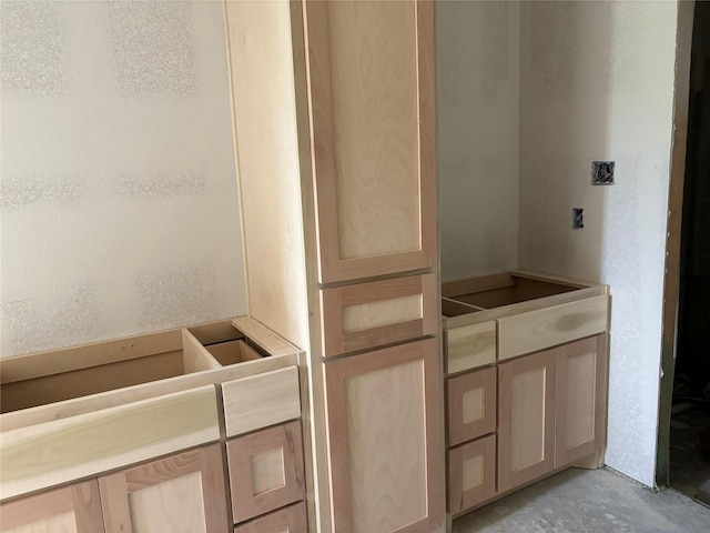 bathroom with unfinished concrete floors
