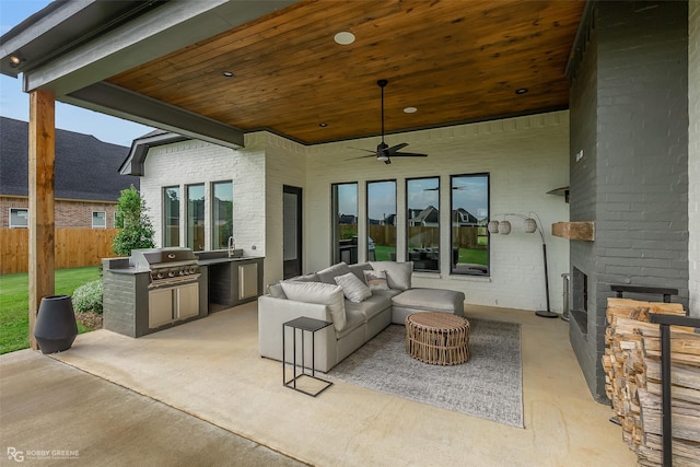 642 Caledonia Dr, Bossier City, LA 71111 - view of patio / terrace with area for grilling, a sink, fence, a ceiling fan, and a grill