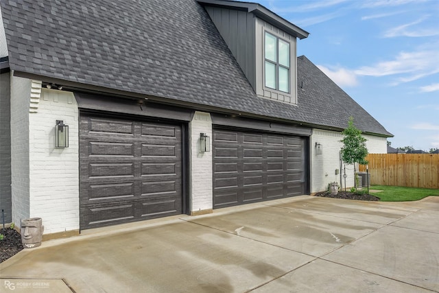 642 Caledonia Dr, Bossier City, LA 71111 - garage with concrete driveway and fence