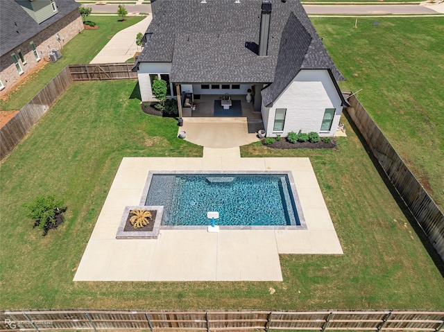 642 Caledonia Dr, Bossier City, LA 71111 - view of swimming pool featuring a lawn, a fire pit, a fenced backyard, and a patio area