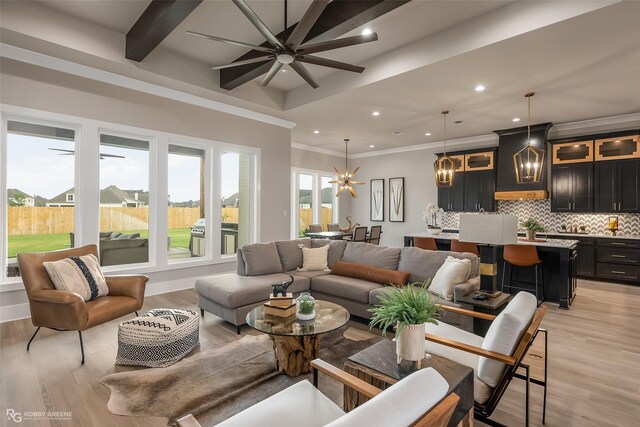 642 Caledonia Dr, Bossier City, LA 71111 - living area featuring crown molding, recessed lighting, light wood-style flooring, and ceiling fan with notable chandelier