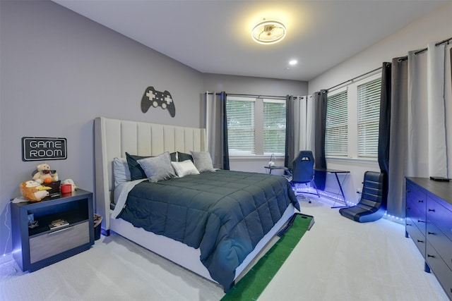 bedroom with light colored carpet