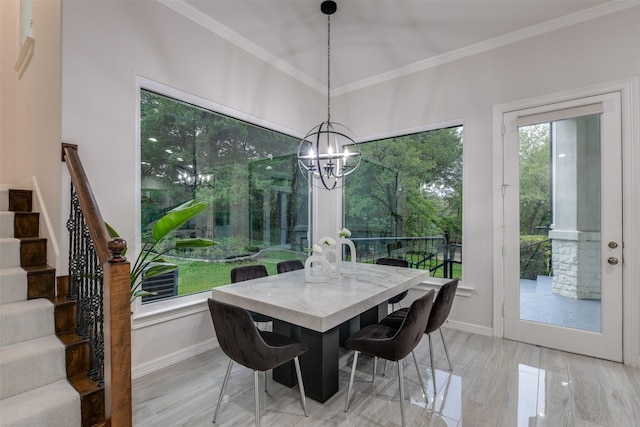 dining room with plenty of natural light, stairs, and ornamental molding