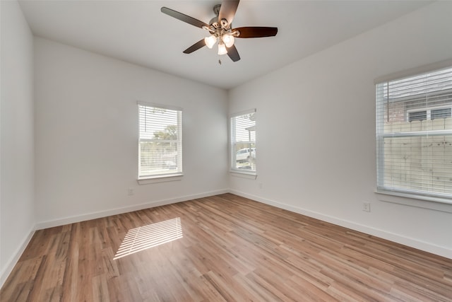 unfurnished room with light hardwood / wood-style flooring and ceiling fan