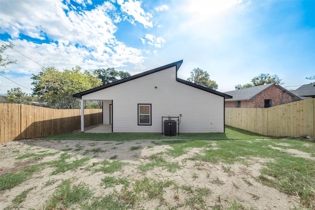 back of property featuring a patio and central air condition unit