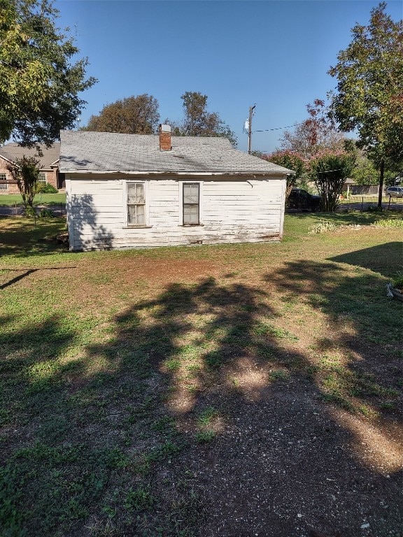 exterior space featuring a yard