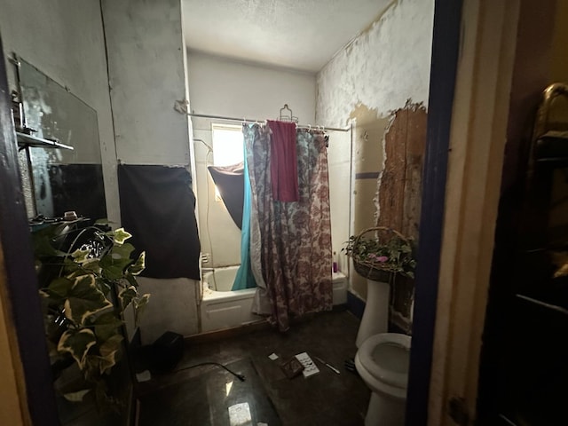 bathroom featuring toilet and shower / bath combo