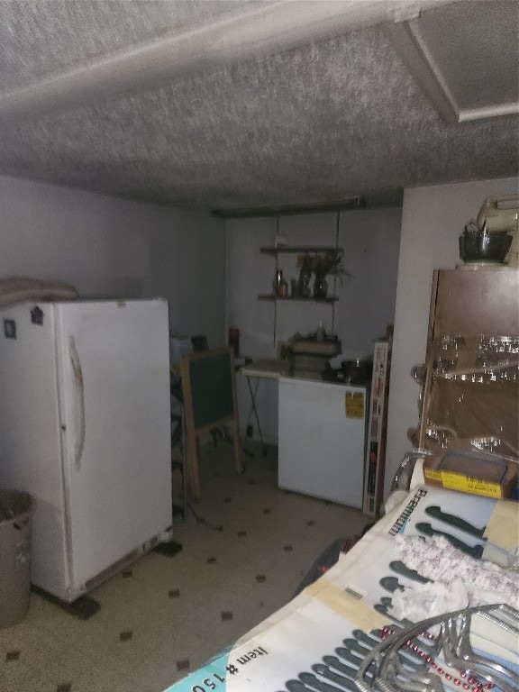 kitchen featuring white refrigerator and refrigerator