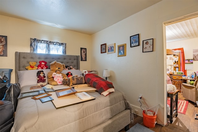 bedroom with wood-type flooring