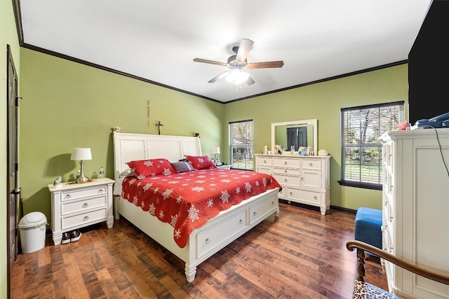 bedroom with ceiling fan, dark wood-type flooring, and crown molding