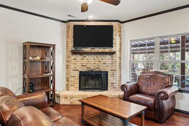 living room with brick wall, ornamental molding, a brick fireplace, and ceiling fan