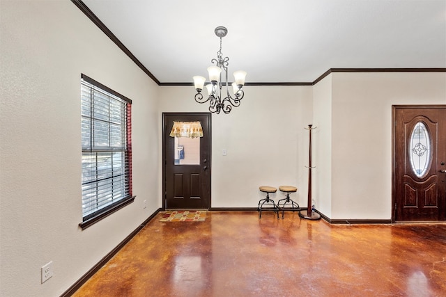 entryway featuring a chandelier and ornamental molding