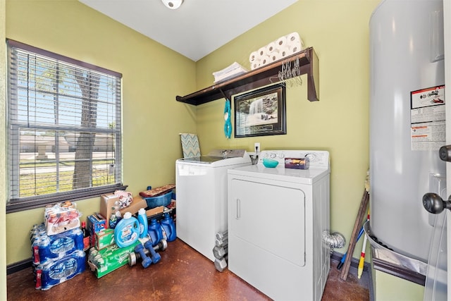 laundry area featuring washer and clothes dryer and water heater