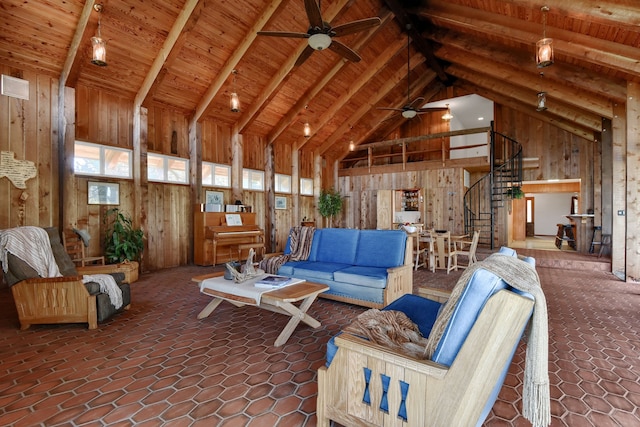 living room featuring beam ceiling, high vaulted ceiling, ceiling fan, and wood walls