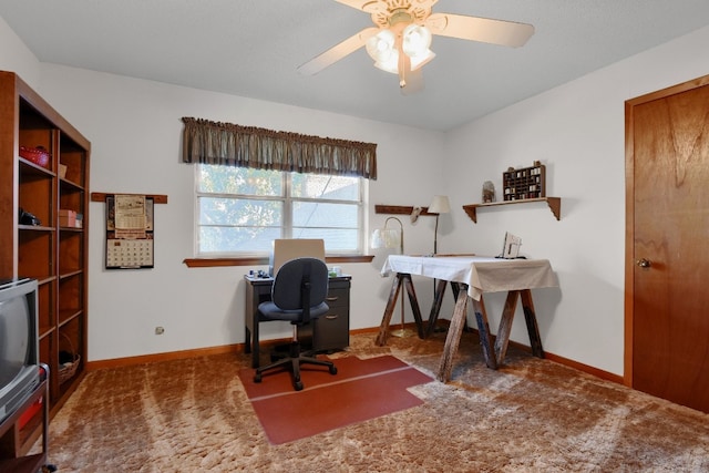 office space with carpet flooring and ceiling fan