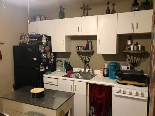 kitchen with white cabinetry, white range with electric cooktop, black refrigerator, and sink