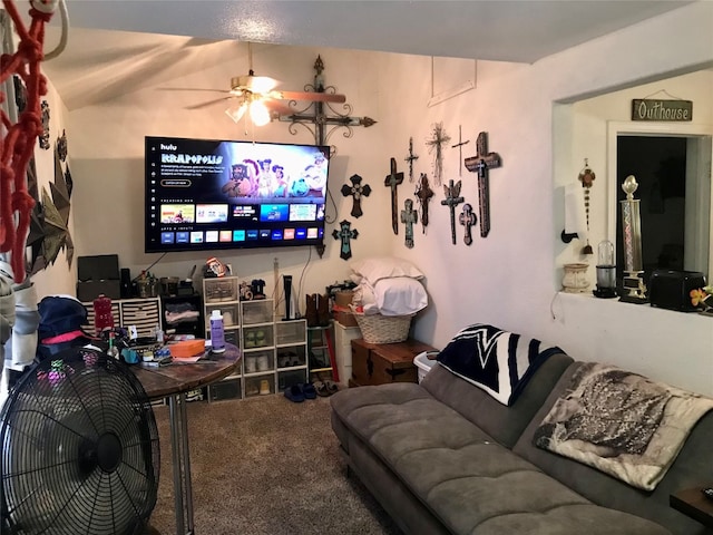 living room with carpet flooring and ceiling fan