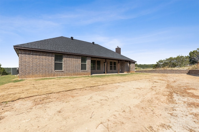 back of property with central air condition unit